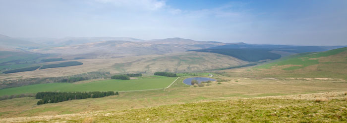 The Roughley and the loch amid the Scottish Borders hills